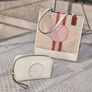 Coach Outlet 七夕甜蜜礼 小马车手拿包$29 馒头挎包$79   